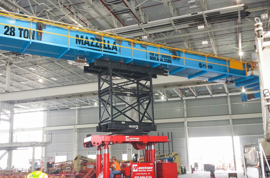 Installing an Overhead Crane in an Existing Building Structure: Raising Crane Into Place in Structure