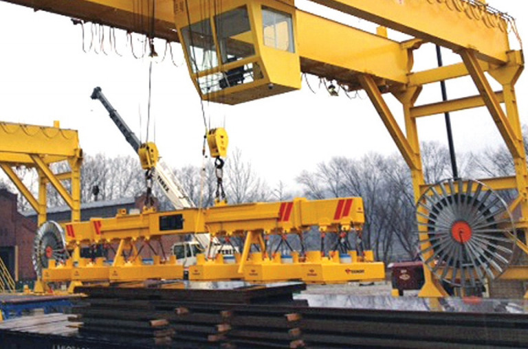 Crane Electrification Conductor Bars vs. Cable Festoon vs. Cable Reel