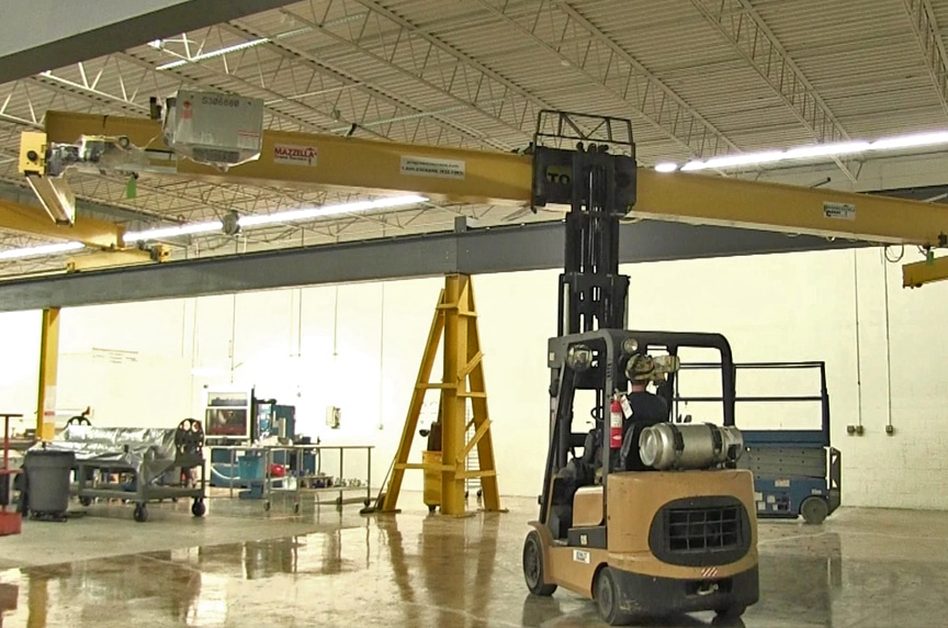 Installing an Overhead Crane in an Existing Building Structure: Raising Bridge Into Place