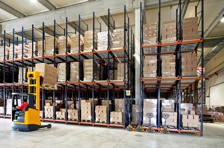 Forklifts vs. Overhead Cranes: Forklift in a Warehouse 2