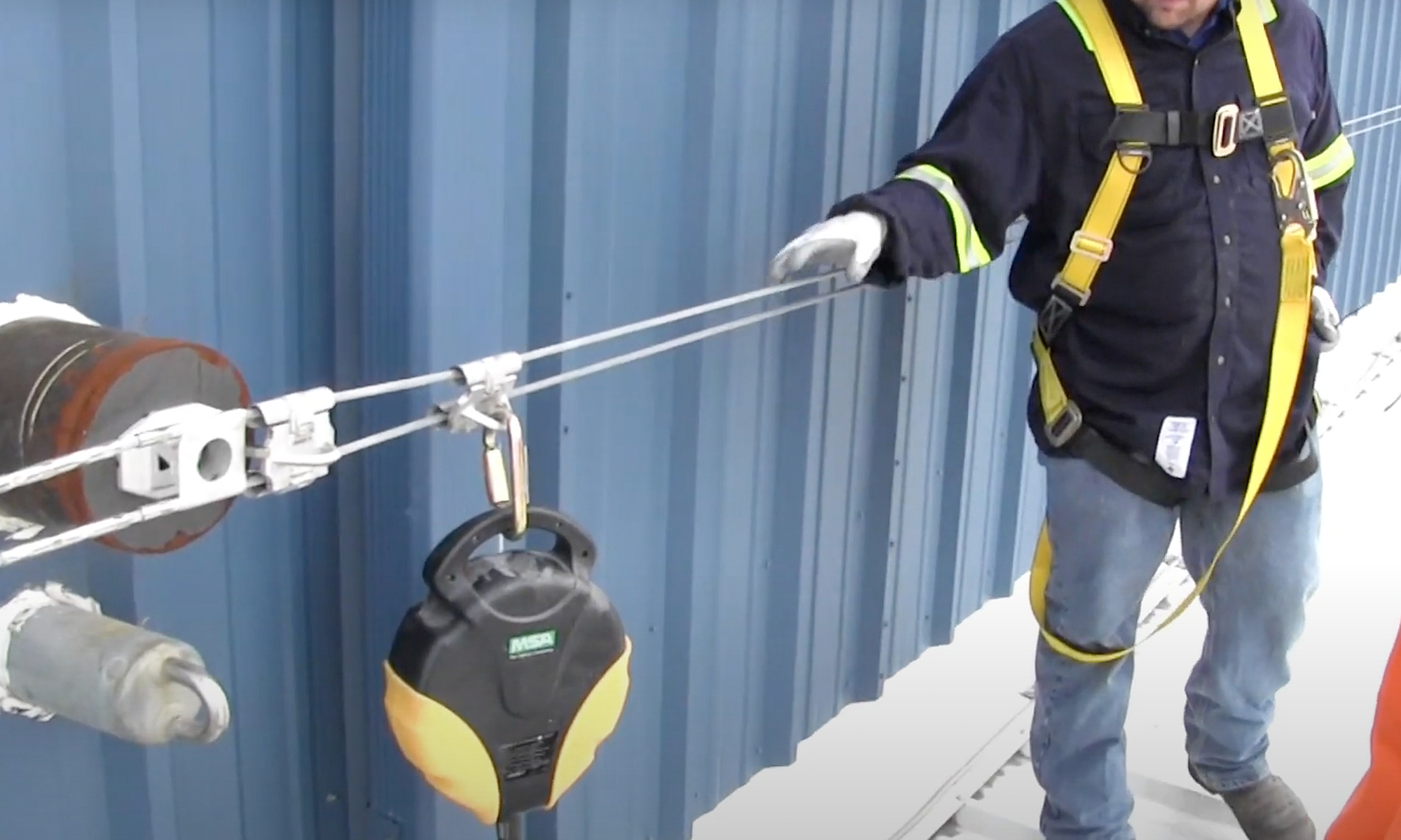 Workers at Height Protected by Horizontal Rooftop Lifeline System