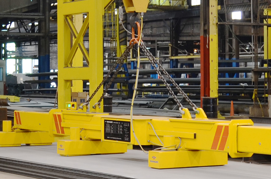 Magnet lifter as it prepares to move large steel plates