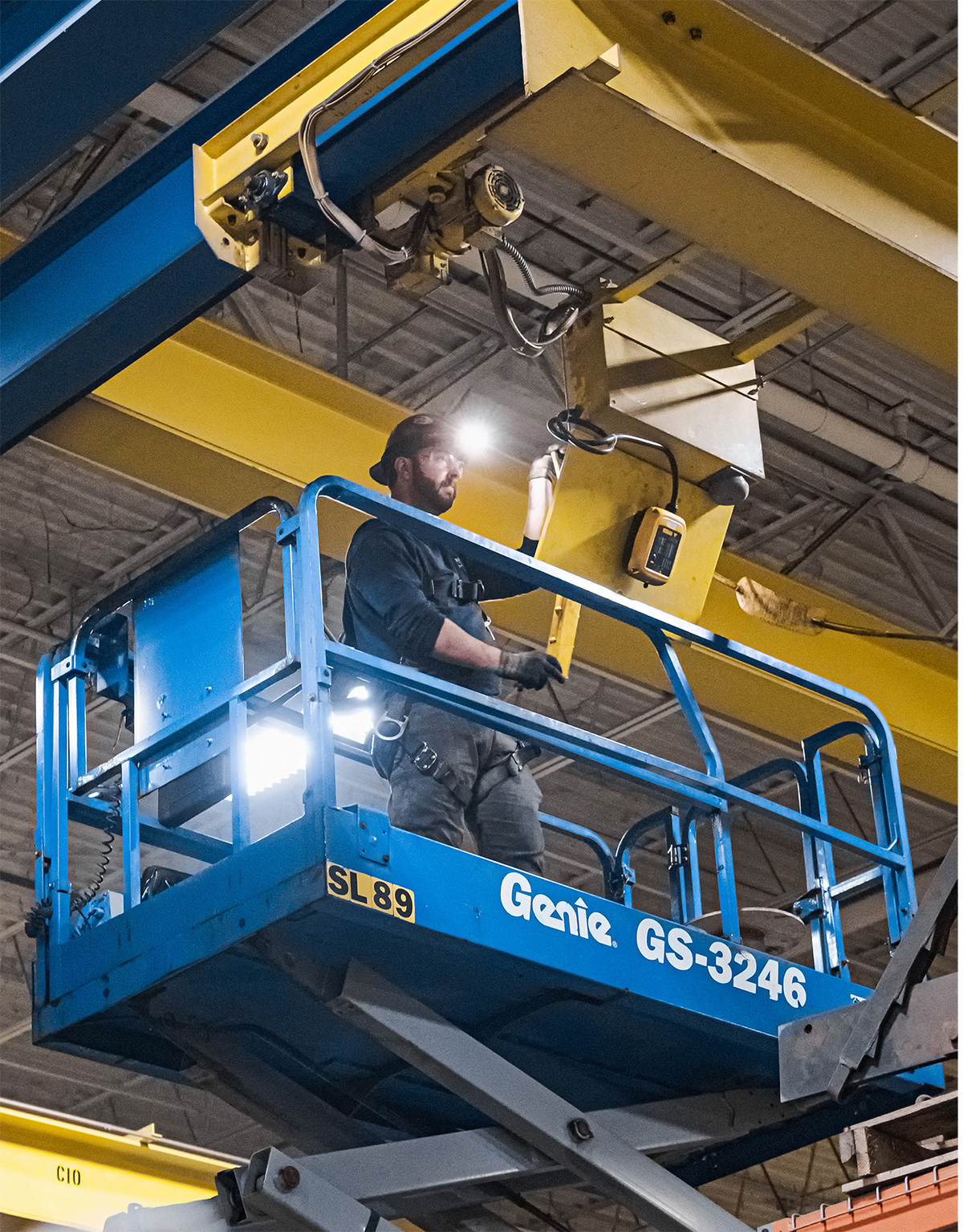 Overhead Crane Service Technician Performing Inspection